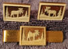 Walluk scrimshaw of a moose cuff links and tie bar